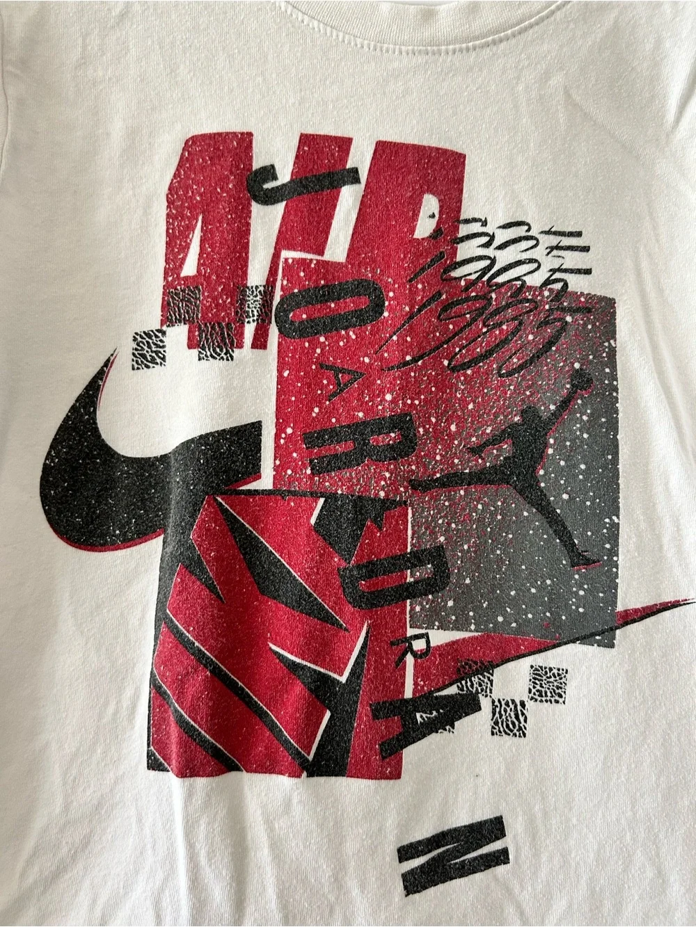 Kids Nike White Graphic Tee with Red & Black Design Small